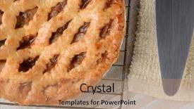 Presentation with kitchen towel - Presentation with closeup of a fresh baked apple pie on a cooling rack next to a serving spatula and towel horizontal format on a white rustic wooden kitchen table background and a coral colored foreground
