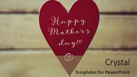  Presentation with happy mothers day - Beautiful PPT theme featuring closeup of a red heart-shaped signboard with the text happy mothers day written in it against a pale green rustic wooden background backdrop and a coral colored foreground