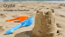  Presentation with toy - Amazing theme having closeup of a sandcastle backdrop and a coral colored foreground