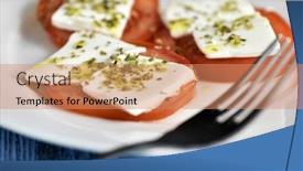  Presentation with oregano - Presentation design consisting of closeup of a white ceramic plate with some slices of tomato topped with fresh cheese and dressed with olive oil and oregano placed on a rustic blue wooden table background and a coral colored foreground