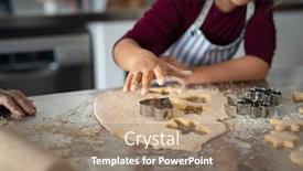  Presentation with christmas baking - Presentation design featuring closeup of child hands cutting cookies from dough little girl in apron pressing cookie cutter for shaping dough girl baking heart shaped christmas biscuits in the kitchen background and a coral colored foreground