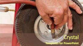  Presentation with tire - PPT theme enhanced with closeup of mechanic putting air in the small tire of a hand cart background and a tawny brown colored foreground