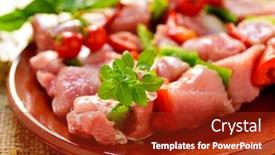  Presentation with raw meat - Audience pleasing presentation consisting of closeup of some raw turkey meat skewers mixed with vegetables in a brown earthenware plate placed on a rustic wooden table backdrop and a crimson colored foreground