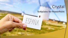  Presentation with espana - Amazing presentation having closeup of the hand of a young man showing a signboard with the word espana spain in spanish in campo de criptana spain with some traditional white windmills in the background backdrop and a light blue colored foreground