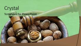  Presentation with mallet - Presentation design enhanced with closeup photo of walnuts in a vintage wooden nut bowl with a nutcracker hammer mallet with brass head easy to crack hard shell on green fabric background background and a mint green colored foreground