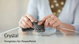  Presentation with gentle - Theme enhanced with closeup portrait of gentle hands of mature woman knitting scarf at table in home interior background and a light gray colored foreground
