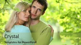  Presentation with green foliage - Cool new PPT theme with closeup portrait of young couple in love outdoors hugging over green foliage background shallow dof backdrop and a yellow colored foreground
