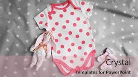  Presentation with baby clothes - Presentation design consisting of baby clothes for newborn background and a soft green colored foreground