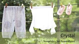  Presentation with baby clothes - PPT theme having clothes hanging on the clothesline background and a  colored foreground