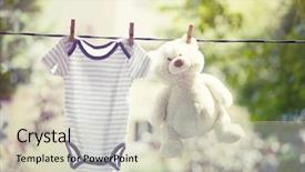  Presentation with baby clothes - Colorful PPT layouts enhanced with clothes hanging on the clothesline backdrop and a soft green colored foreground