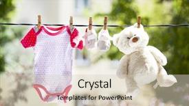  Presentation with christian baby shower - Amazing PPT layouts having clothes hanging on the clothesline backdrop and a soft green colored foreground