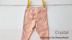  Presentation with baby girl - Theme enhanced with clothes-laundry-babyhood-and-clothing background and a coral colored foreground