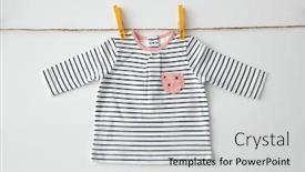 Presentation with baby girl - Amazing PPT layouts having clothes-laundry-babyhood-and-clothing backdrop and a light gray colored foreground