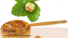  Presentation with jam - Colorful presentation enhanced with cloudberry jam bowl with fresh berry close up isolated on white background backdrop and a gold colored foreground