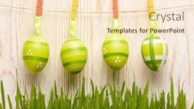 Presentation with greeting card - Beautiful PPT theme featuring colored easter eggs and spring green grass on a wooden background greeting card backdrop and a lemonade colored foreground