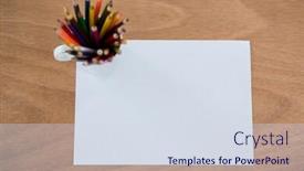  Presentation with colored pencils - Audience pleasing slide set consisting of colored pencils kept in pencils holder kept on blank paper on wooden background backdrop and a sky blue colored foreground