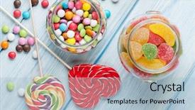  Presentation with colorful - Presentation theme having colorful candies on wooden table background and a light blue colored foreground