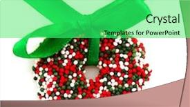  Presentation with christmas chocolate - Colorful slide deck enhanced with colorful chocolate christmas wreath in green and red with ribbon backdrop and a seafoam green colored foreground