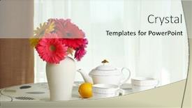  Presentation with teapot - Colorful presentation enhanced with colorful gerbera in vase with teapot cups and lemons on table on curtains background backdrop and a sky blue colored foreground