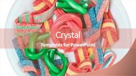  Presentation with gummy candy - Presentation theme consisting of colorful gummy candy licorice sweets on a white plate isolated background and a coral colored foreground