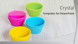  Presentation with baking - Presentation design enhanced with colorful silicone baking cups on wooden background background and a soft green colored foreground