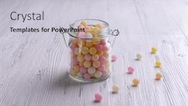  Presentation with sprinkles - Presentation theme consisting of colorful sprinkles on jar on table close-up background and a light gray colored foreground