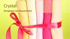  Presentation with ribbon green - Amazing presentation having colorful towels with ribbon on green background backdrop and a cream colored foreground