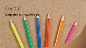  Presentation with pencils - Audience pleasing PPT theme consisting of colour-pencils-on-orkboard-school backdrop and a coral colored foreground