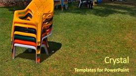  Presentation with bright blue colour for - Audience pleasing slide set consisting of coloured chairs on a lawn backdrop and a tawny brown colored foreground