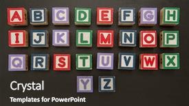  Presentation with colour blocking building blocks - Colorful slides enhanced with colourful alphabet blocks on blackboard backdrop and a dark gray colored foreground
