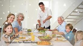  Presentation with falling snow - Slides consisting of composite image of smiling father serving meal to family against snow falling background and a coral colored foreground