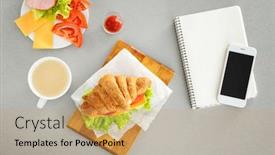  Presentation with croissant - Theme with composition with delicious croissant sandwich on table background and a coral colored foreground