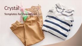  Presentation with childish - Audience pleasing PPT theme consisting of composition with fashionable childish clothes backdrop and a lemonade colored foreground