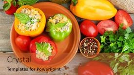  Presentation with peppers - Amazing presentation theme having composition with stuffed peppers on plate and fresh herbs spices and vegetables on wooden background backdrop and a red colored foreground