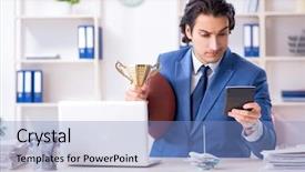  Presentation with motivation ball hill businessman - Presentation enhanced with computer award - young handsome businessman with rugby background and a light blue colored foreground