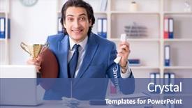  Presentation with motivation ball hill businessman - PPT theme with computer award - young handsome businessman with rugby background and a ocean colored foreground