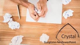  Presentation with desk - Presentation design featuring computer documentation - hands crumpling paper on wooden background and a coral colored foreground
