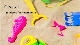  Presentation with beach toys on sand - Audience pleasing presentation theme consisting of concept - close up of sand backdrop and a yellow colored foreground