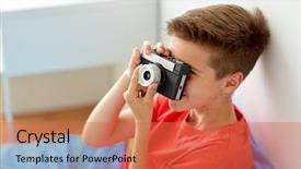  Presentation with camera film - Beautiful PPT theme featuring concept - happy boy with film backdrop and a  colored foreground