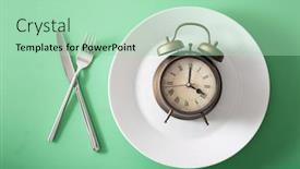  Presentation with ketogenic diet - PPT theme with concept of intermittent fasting ketogenic diet weight loss fork and knife crossed and alarmclock on plate background and a mint green colored foreground