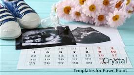  Presentation with baby ultrasound - Slide deck with concept ultrasound photo and calendar background and a sky blue colored foreground