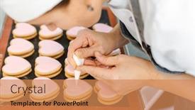  Presentation with greetings - Slide deck enhanced with confectioner woman writing messages and greetings on cookies background and a coral colored foreground