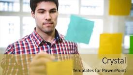  Presentation with creative writing - Slide set having confident businessman writing on sticky notes in creative office background and a yellow colored foreground