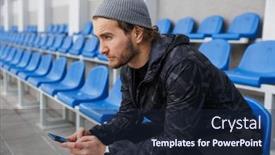  Presentation with confident - Amazing PPT theme having confident-young-sportsman-sitting backdrop and a wine colored foreground