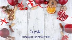  Presentation with holly christmas frame - PPT theme consisting of congratulation red orange - christmas frame with apples cookies background and a sky blue colored foreground