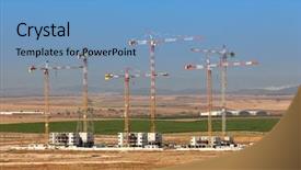  Presentation with construction cranes - Audience pleasing PPT theme consisting of construction site of new neighborhood backdrop and a teal colored foreground
