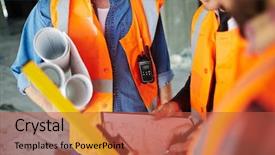  Presentation with food service planning - Audience pleasing presentation consisting of constructors planning work or discussing backdrop and a  colored foreground