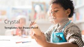  Presentation with crayon - Beautiful PPT layouts featuring contemporary schoolboy with crayon rolling piece of paper while sitting by desk and making toy at lesson backdrop and a lemonade colored foreground