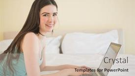  Presentation with camera - Slide set with content girl looking at camera using a laptop lying on a bed at home in bedroom background and a soft green colored foreground