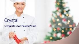 Presentation with christmas food - Audience pleasing theme consisting of cooking holidays people and food concept - smiling female chef spicing vegetable salad over living room with christmas tree background backdrop and a sky blue colored foreground